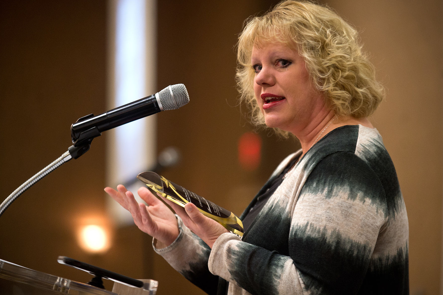Roxanne Hartrich accepting the Community Award